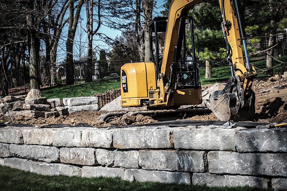 construction on natural stone retaining wall